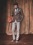 Americana de espiga marrón de la firma H.E. By Mango para el otoño/invierno 2011-2012