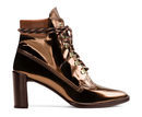 Botines en cobre metalizado de la colección 'Gigi Boot' de Stuart Weitzman