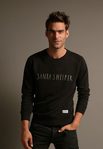 Jon Kortajarena con un jersey diseñado por él para la campaña 'Christmas Jumper Day' de Save The Children