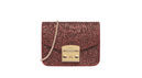 Bolso de mano con purpurina roja de Furla colección Navidad 2016