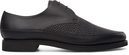 Zapatos negros de la colección masculina de Cartujano primavera/verano 2017