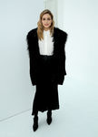 Olivia Palermo con un look bicolor en el desfile de Delpozo en la New York Fashion Week