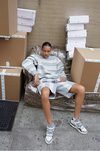 Total look a rayas de la colección cápsula de Alexander Wang para Adidas Originals
