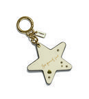 Llavero blanco 'Selena Star' de la colección 'Coach x Selena Gomez'