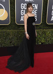 Dakota Johnson con un diseño de Gucci en los Globos de Oro 2018