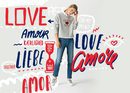 Sudadera gris con letras y un corazón estampados de la colección TommyXLove para San Valentín de Tommy Hilfiger