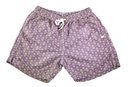 Bañador morado con estampados abstractos de colores de Naïve para el verano 2018