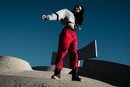 Modelo luciendo ropa Puma y las nuevas zapatillas deportivas XO 2.0 con la colaboración de The Weeknd