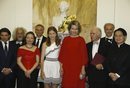 La Princesa Elisabeth de Bélgica con un diseño de Maje junto a su madre en un concierto de música clásica