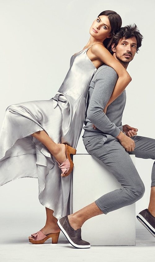 Isabel Fontana y Andrés Velencoso posando con zapatos de tonalidad pastel para Carmela primavera/verano 2018
