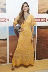 Ariadne Artiles en la presentación del 'Masaai Project' con un vestido color mostaza