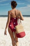 Bañador burdeos de topos blancos de la nueva colección de Oysho SS18