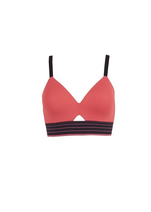Top 'Waves Mesh Panel Sports Bra' en tono coral de la colección 'Days of Summer' de Spanx