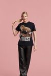 Camiseta negra con un estampado animal de la firma lujosa Nyden 2018