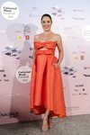Eva Marciel con un vestido naranja en el concierto de Gregory Porter en Madrid 2018