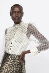 Blusa lunares con falda animal print Zara primavera-verano 2019