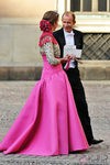 La Infanta Elena con vestido largo en rosa capote y torera goyesca de Lorenzo Caprile
