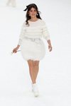 Penélope Cruz con un total white look durante el desfile otoño/invierno 2019/2020 de Chanel