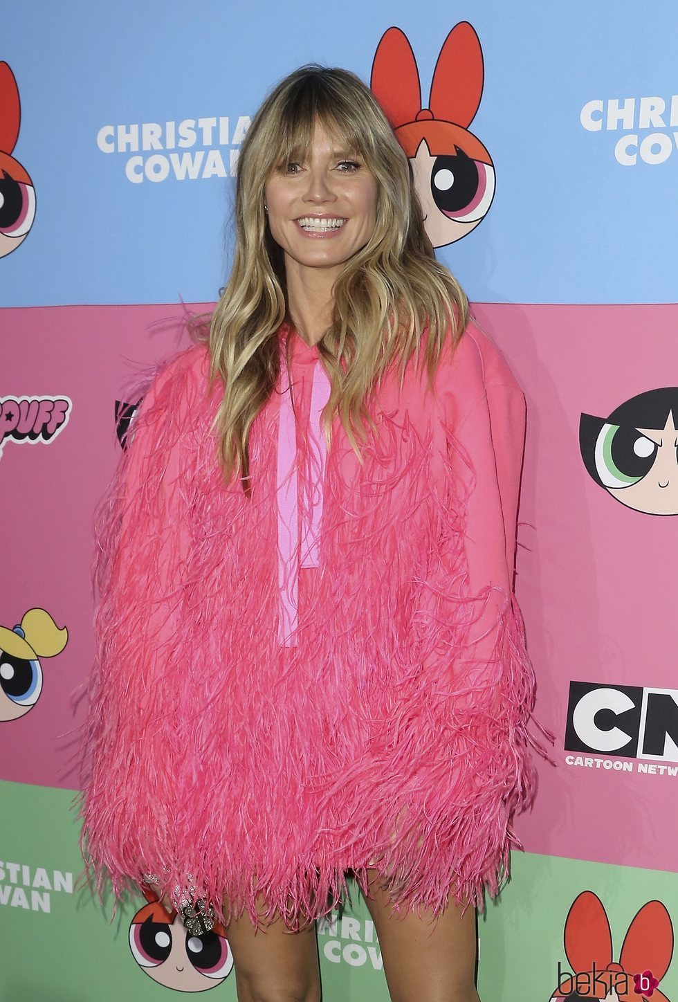 Heidi Klum con un vestido corto rosa