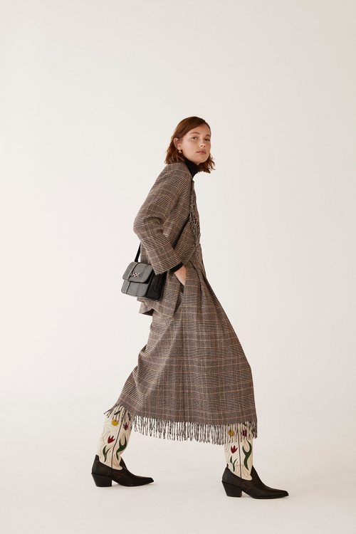 Traje tweed de la colección otoño/invierno 2019 de Mango