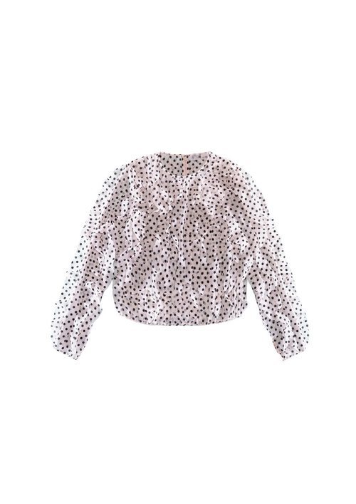 Blusa blanca con lunares de la colección de H&M y Giambattista Valli