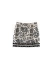 Falda corta blanca de la colección de H&M y Giambattista Valli