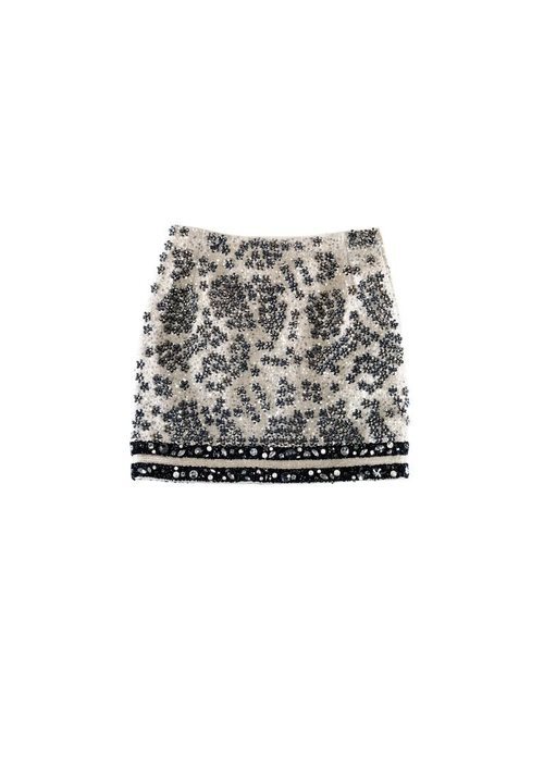 Falda corta blanca de la colección de H&M y Giambattista Valli