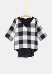 Jersey con cuadros y blusa de la colección de Rocío Osorno y TEX de otoño/invierno 2019