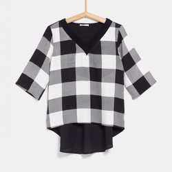 Jersey con cuadros y blusa de la colección de Rocío Osorno y TEX de otoño/invierno 2019