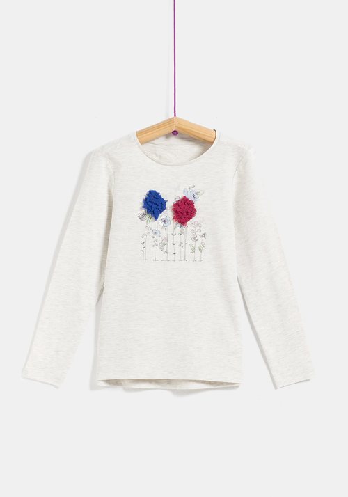 Camiseta blanca con flores para niña de la colección 'I-O' de Carrefour y TEX para otoño/invierno 2019