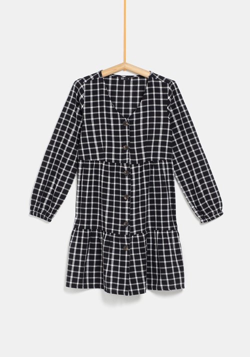 Vestido de cuadros negros de la colección 'I-O' de Carrefour y TEX para otoño/invierno 2019