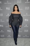 Kim Kardashian con un total look denim y botas de latex en los Innovation Awards 2019
