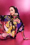 María Escoté con sudadera y mallas de la colección de María Escoté para Desigual