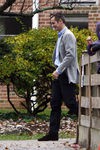Iñaki Urdangarín con pantalones negros y americana gris