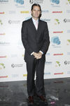 Iñaki Urdangarín con traje gris oscuro y corbata rosa palo