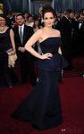 Tina Fey con peplum en la alfombra roja de los Oscar 2012