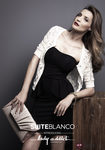 Lady Addict con vestido palabra de honor de SuiteBlanco