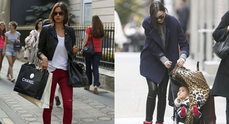 Irina Shayk con pantalones rojos, chaqueta de cuero negra y sneakers de Isabel Marant