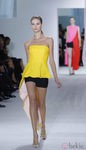 Top peplum y shorts negros en el desfile de Dior en la Semana de la Moda de París primavera/verano 2013
