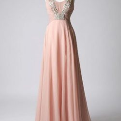 Vestido rosa empolvado con pedrería de la colección de vestidos de Barbarella