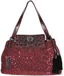 Bolso rojo con paillettes de la colección otoño/invierno 2012/2013 de Loeds