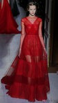 Vestido rojo de tul de la colección primavera/verano 2013 de Valentino en la Semana de la Alta Costura de París