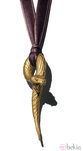 Colgante de serpiente de Carrera y Carrera