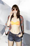 Parte de arriba de bikini naranja de la colección 'Mix and match' de Asos para primavera/verano 2013