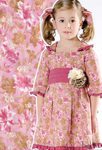 Vestido fucsia con flores de la colección 'Ceremonia' de Trasluz para este 2013