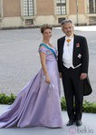 La Princesa Marta Luisa de Noruega con un vestido violeta en la boda de Magdalena de Suecia y Chris O'Neill