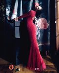 Candice Swanepoel con un vestido rojo del otoño/invierno 2013/2014 de Blumarine
