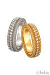 Anillos de oro blanco y amarillo de la colección 'Ruedo Bridal' de Carrera y Carrera