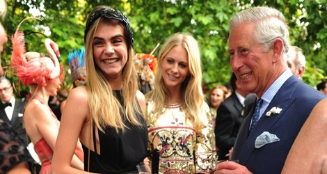 Cara Delevingne con su hermana y Carlos de Inglaterra