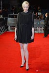 Gwendoline Christie con un vestido negro en la alfombra roja de los BAFTA 2014